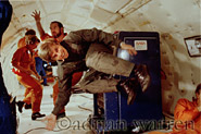 Adrian Warren and the film crew floating in zero gravity