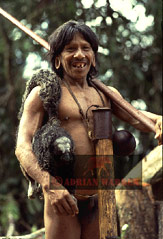 Waorani Indian: with Saki Monkey after hunt