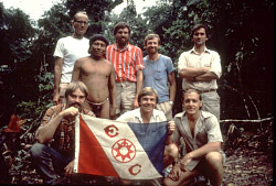 (left to right) Kelly Shannon (rear), Joel Rettig, Menga, Jim Larrick, Adrian Warren, James Yost, Grant Behrman, Hugh Maynard, rio Cononaco, Ecuador, 1983